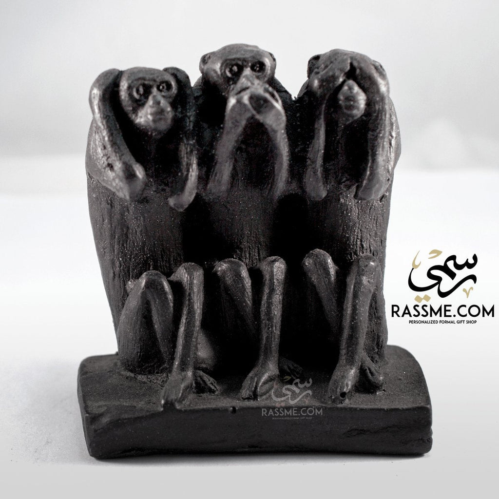 Three Wooden Monkeys